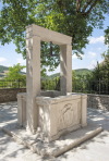 Stone well - Cardinal Fausto Poli - Church of San Salvatore - Usigni - Poggiodomo